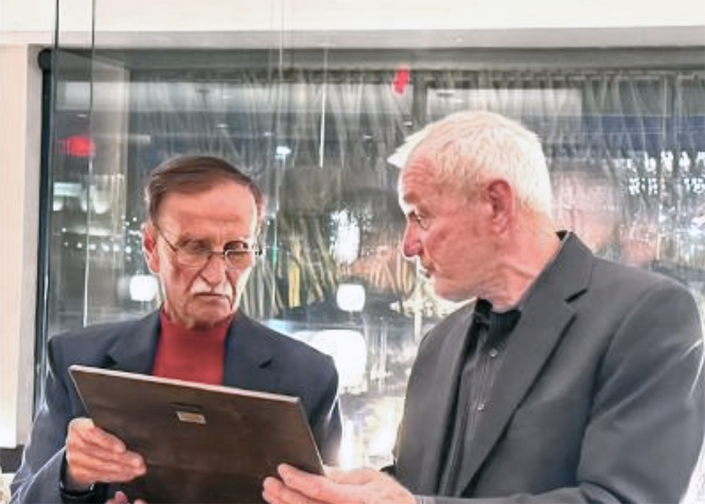 Gale Lush receives ACGF Leadership Award in May 2025 from ACGF Vice- Chairman Mark Lounsbery of Revillo, South Dakota
